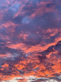 Low angle view of dramatic sky during sunset