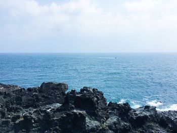 Scenic view of sea against clear sky