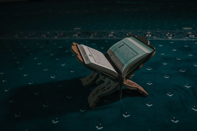 High angle view of open book on table