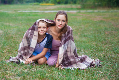 Portrait of smiling girl on grass