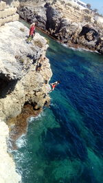 High angle view of rock formation in sea