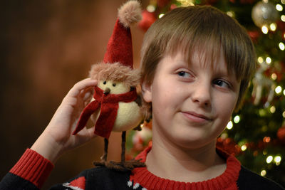 Portrait of boy with stuffed toy