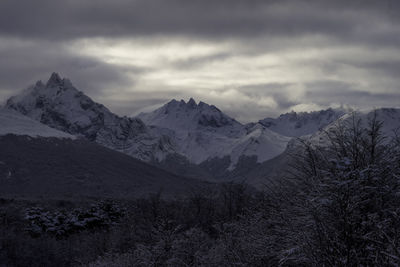 Scenic view of snowcapped mountains against sky