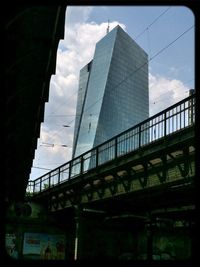 View of buildings against cloudy sky