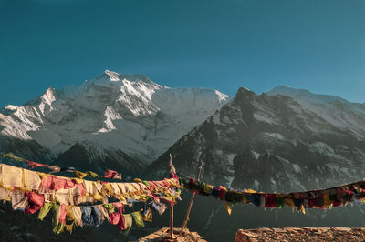 Scenic view of mountains against sky during winter