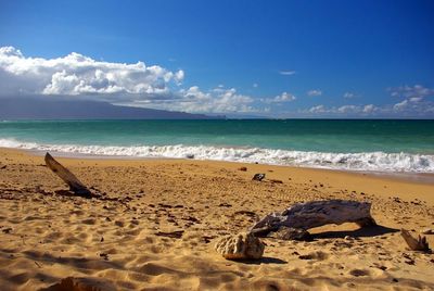 Scenic view of beach against sky