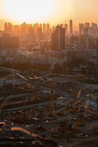 High angle view of city at sunset