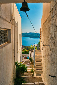 Greek village typical view with whitewashed houses and stairs. plaka town, milos island, greece