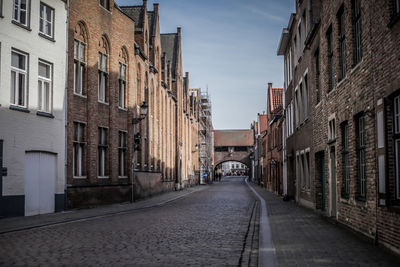 Narrow alley along buildings