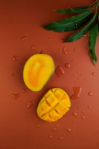 High angle view of lemon on wet table