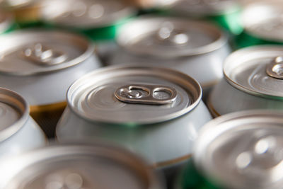 Closed aluminum beverage cans, photographed against the light. use and recycling of aluminum.