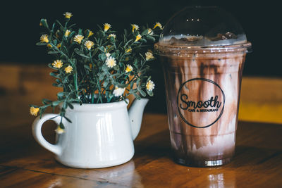 Close-up of glass jar on table