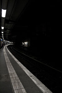 Railroad station platform at night