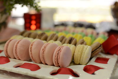 Close-up of multi colored candies on table