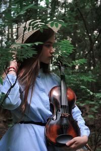 Young woman playing violin