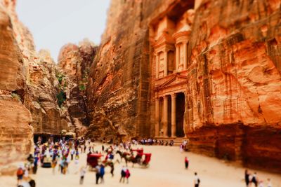 Group of people in front of built structure