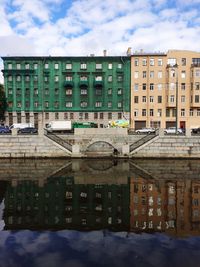 Buildings in city against sky