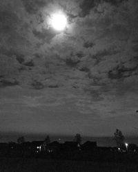 Low angle view of illuminated sky at night