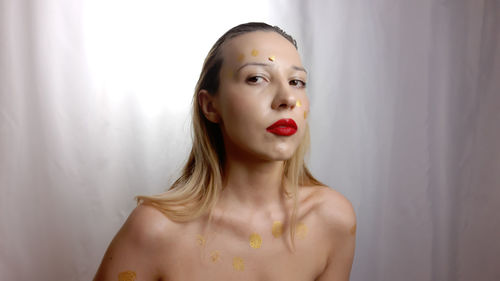 Artist's work. bodyart, beauty, make up, fashion, style, naked shoulders, red lipstick