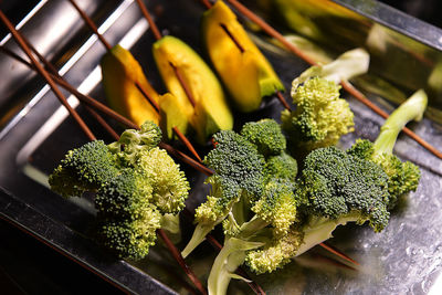 Close-up of vegetables in skewer on table