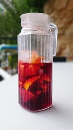 Close-up of drink in jar on table