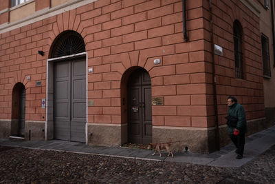 Man standing by building