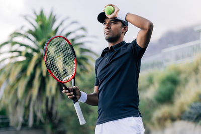 Young man playing tennis