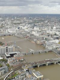 High angle view of river amidst buildings in city