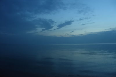 Scenic view of sea against blue sky