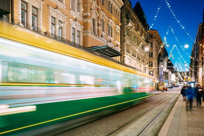 Blurred motion of cable car on street