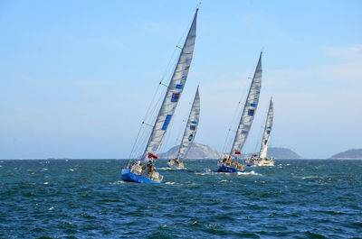 Boats sailing in sea