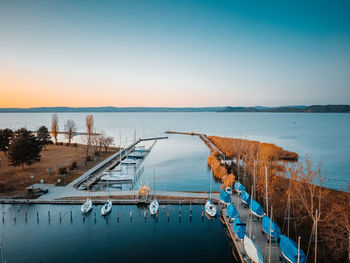 High angle view of swimming pool by sea against clear sky