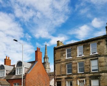 Low angle view of buildings against sky