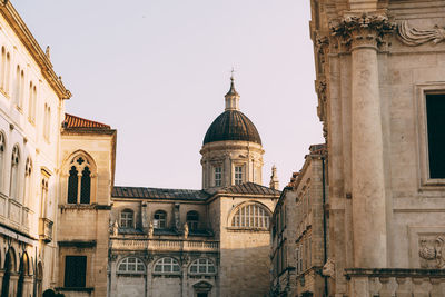 Low angle view of building against sky in city