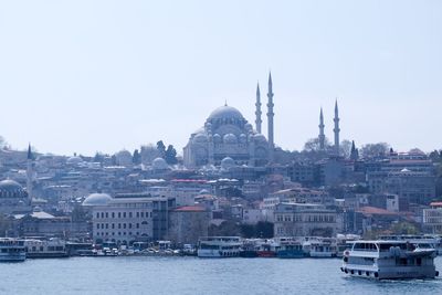 View of buildings in city against sky