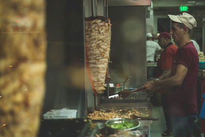 Man preparing food in restaurant