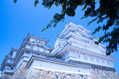 Low angle view of cathedral against blue sky