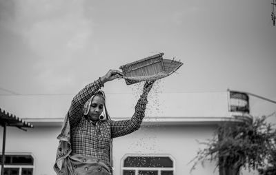 Portrait of an  indian rural woman doing daily chores