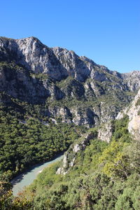 Scenic view of mountains against clear sky