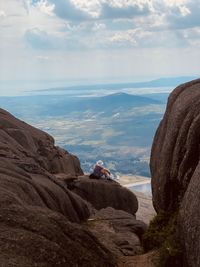 Scenic view of a man against sky