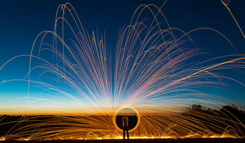 Firework display at night