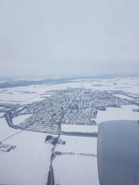 Scenic view of frozen sea against sky