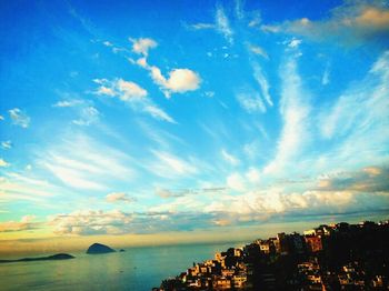 Scenic view of sea against cloudy sky