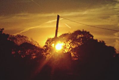 Sun shining through clouds