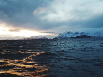 Scenic view of sea against sky during sunset