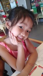 Portrait of cute girl smiling