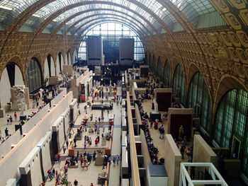 View of people walking on tiled floor