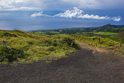 Scenic view of land against sky