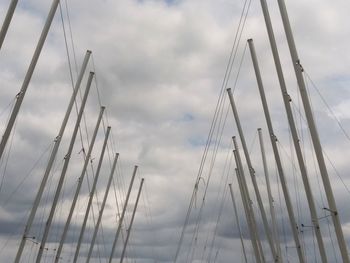 Low angle view of sailboat in sea against sky