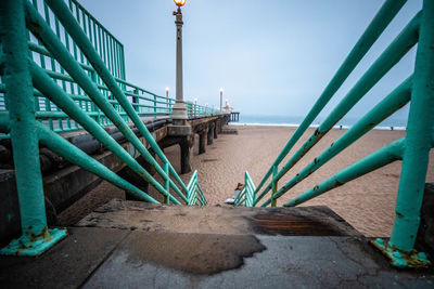 Pier over sea against sky